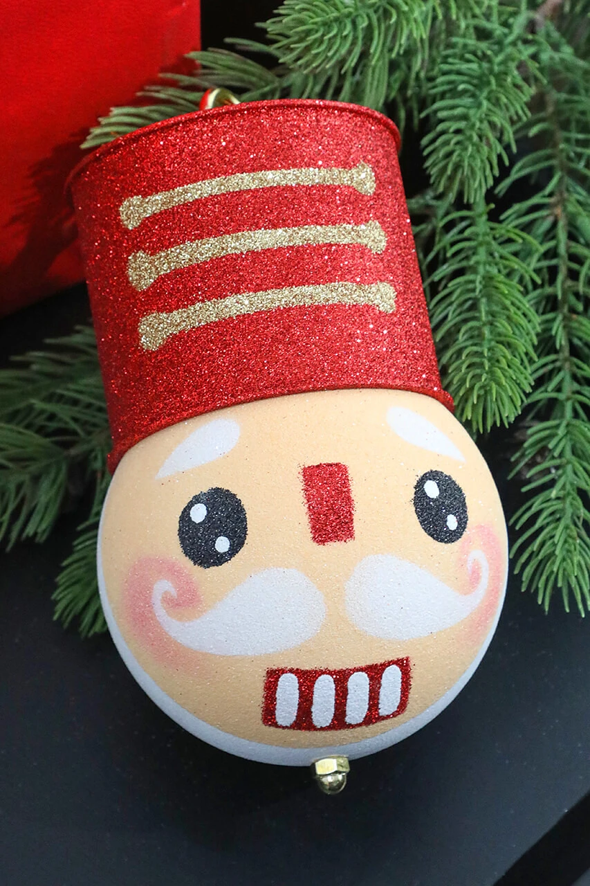 8.5β Holiday Nutcracker Red Ornament